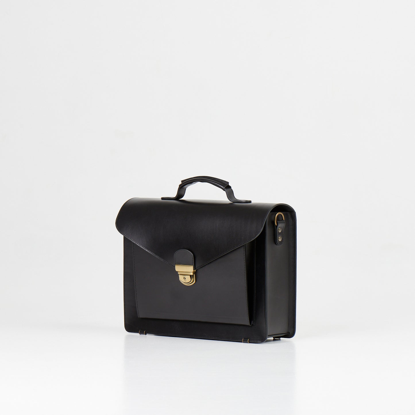 Papillon black artisan leather business bag with top handle and front clasp closure for professionals