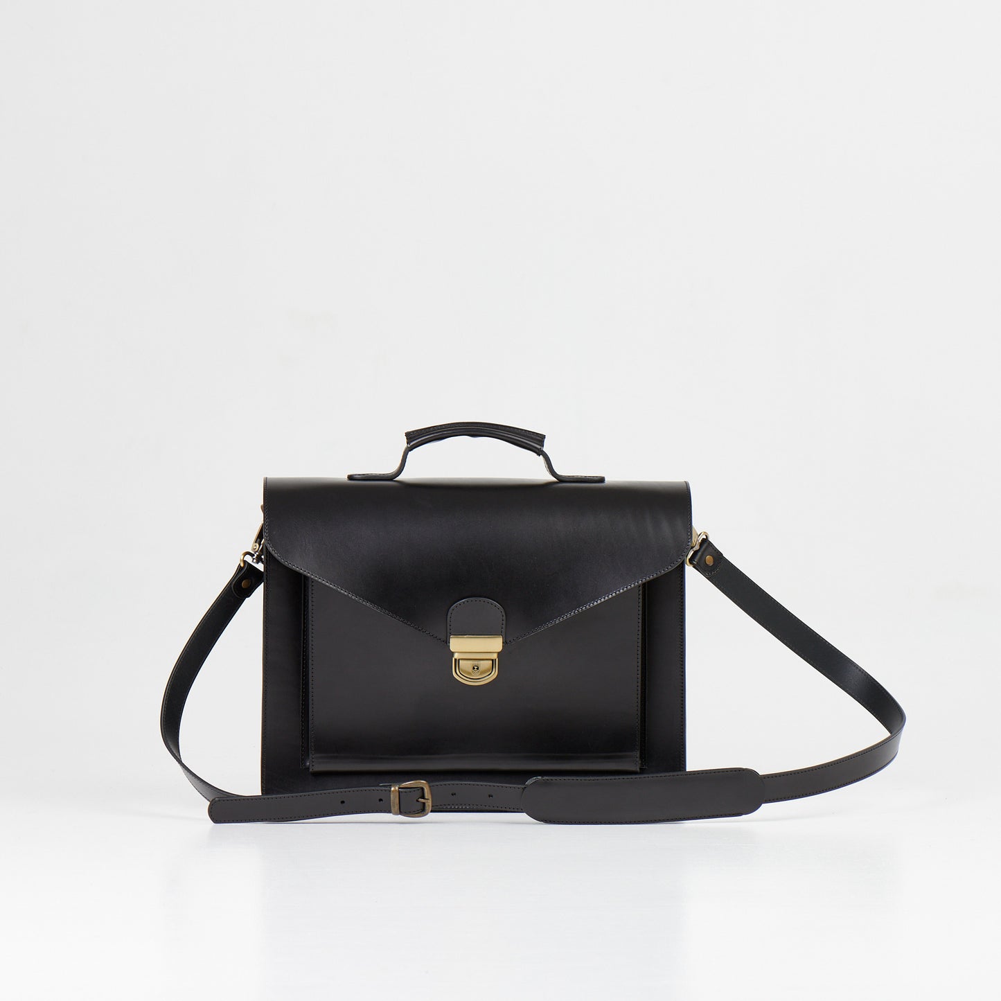 Papillon black artisan leather business bag with top handle and adjustable shoulder strap