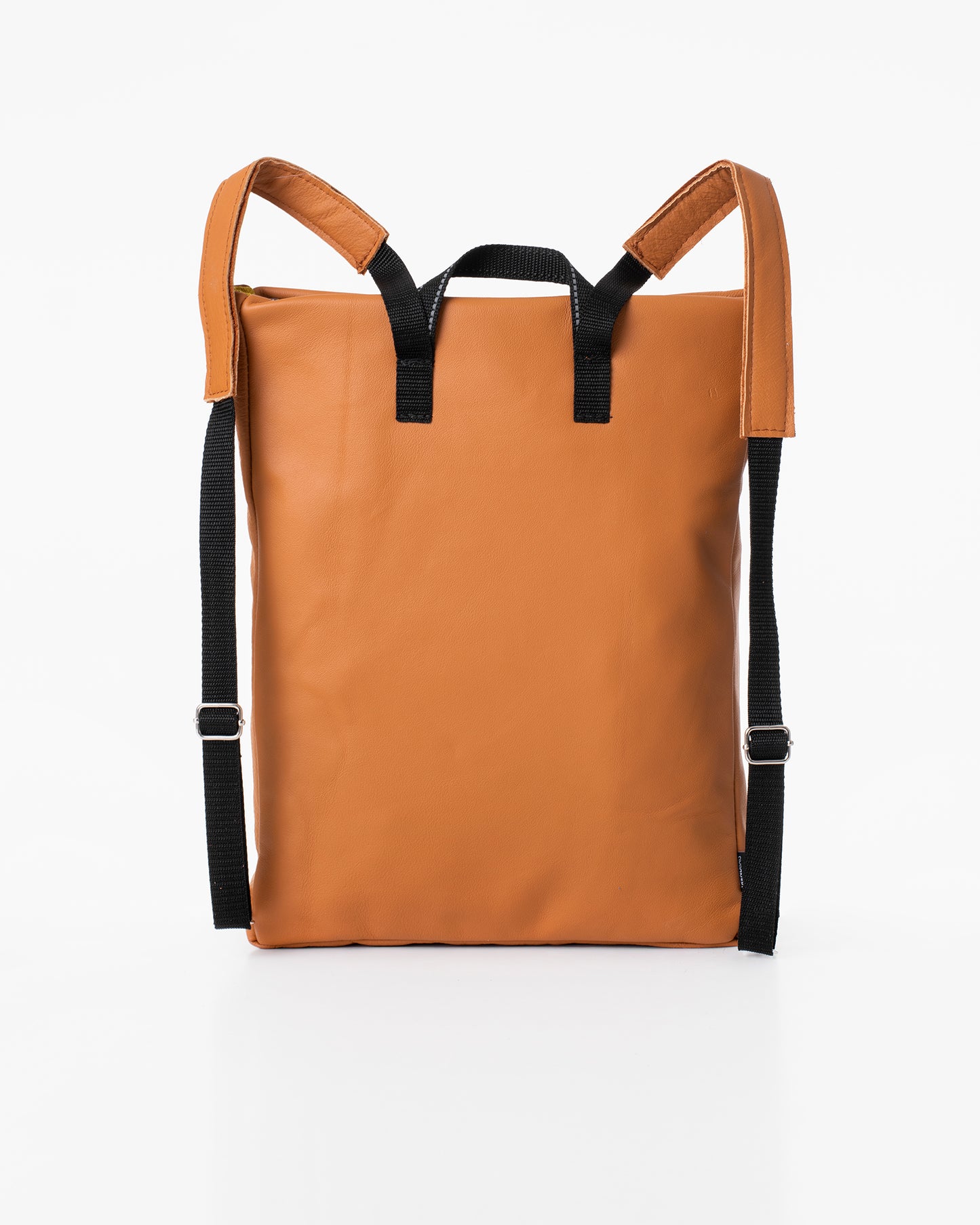 Calvados brown leather backpack by Trendbag with black adjustable straps and minimalist design