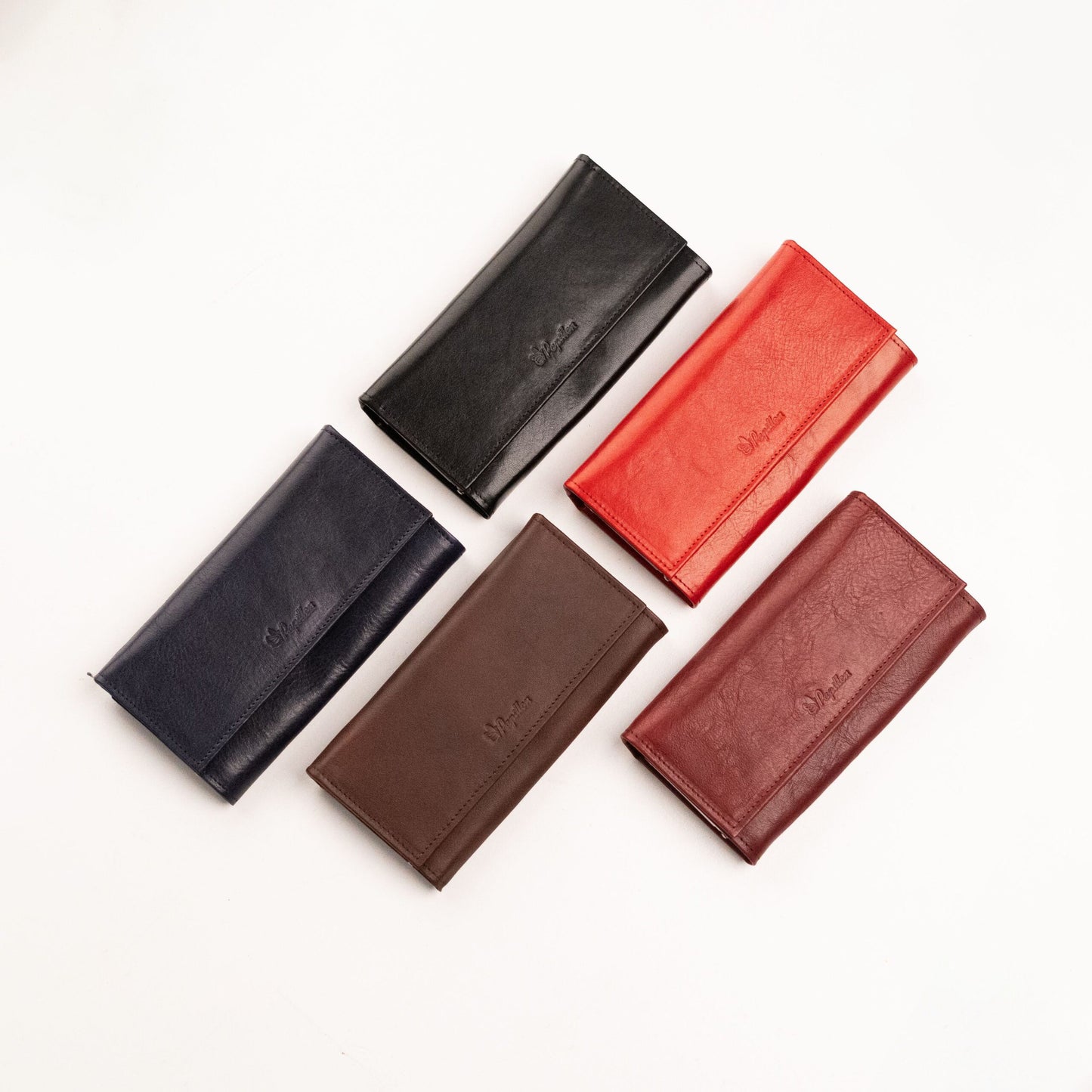 Papillon Estonian leather wallet collection in black red brown and navy colors on white background