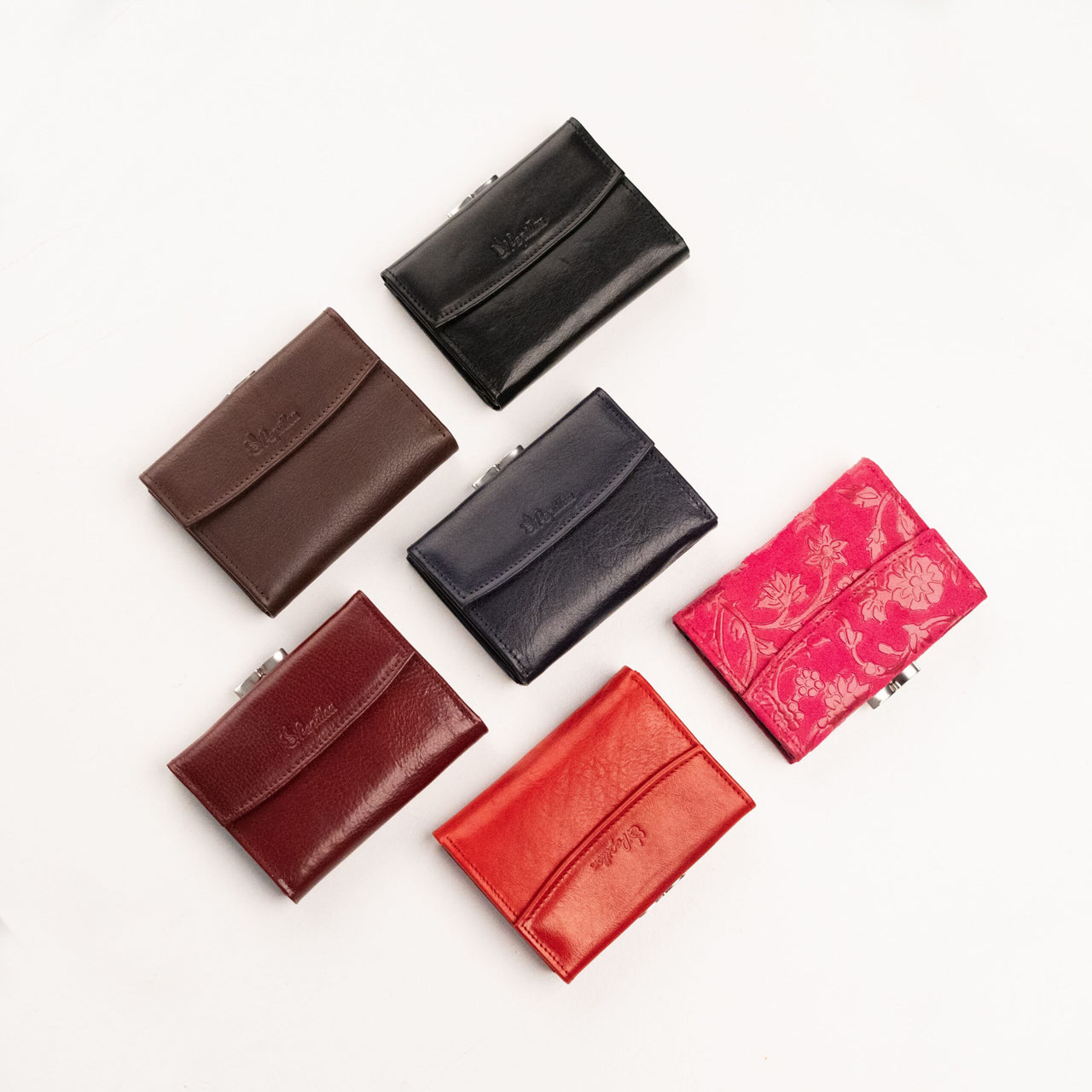 Papillon genuine leather ladies wallet collection in various colors including black, brown, navy, red, maroon, and floral pink