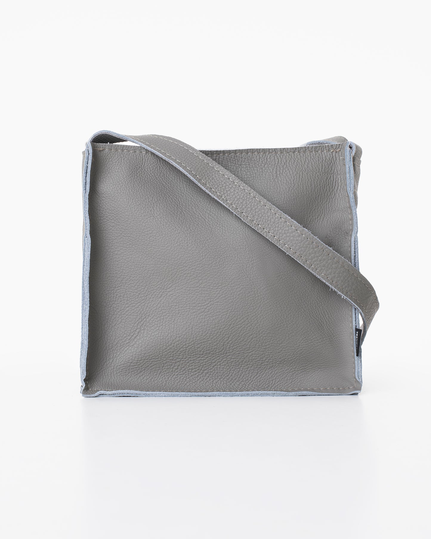 Light grey shoulder bag by Trendbag with a simple square design and adjustable strap
