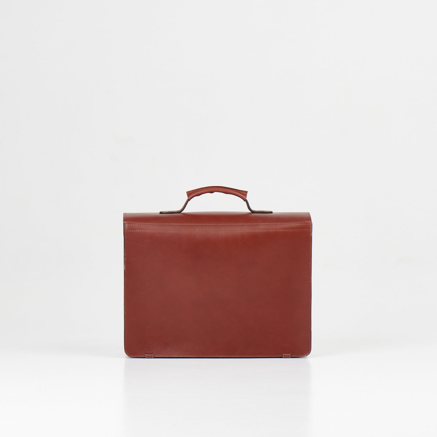 Papillon luxury leather work bag in brown with top handle and sleek minimalist design