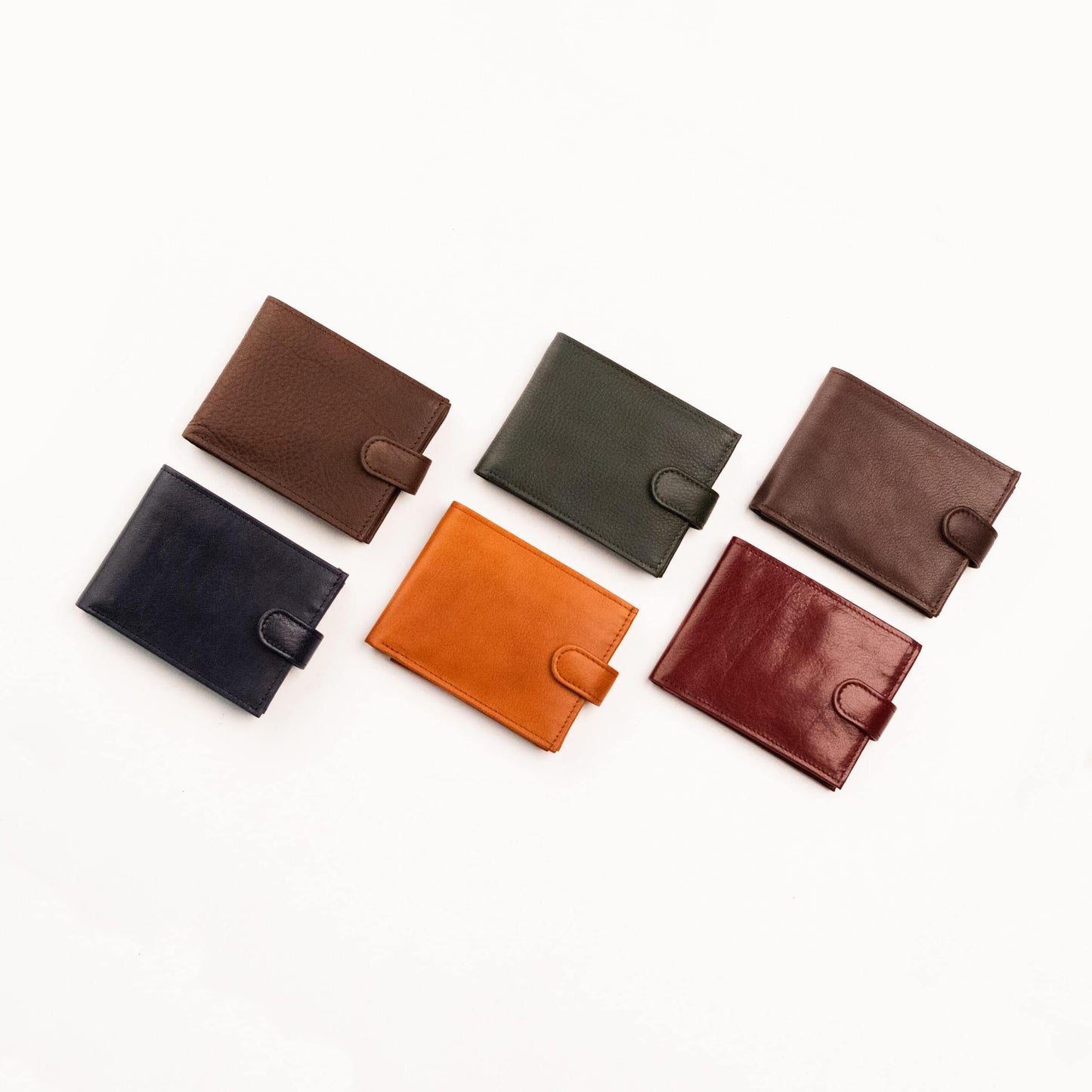 Papillon men's genuine leather wallet collection in brown, black, green, tan, and maroon colors