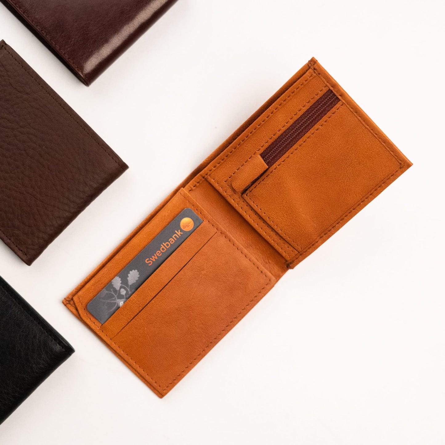 Papillon minimalist men's wallet open in tan leather with card slots and zippered coin pocket