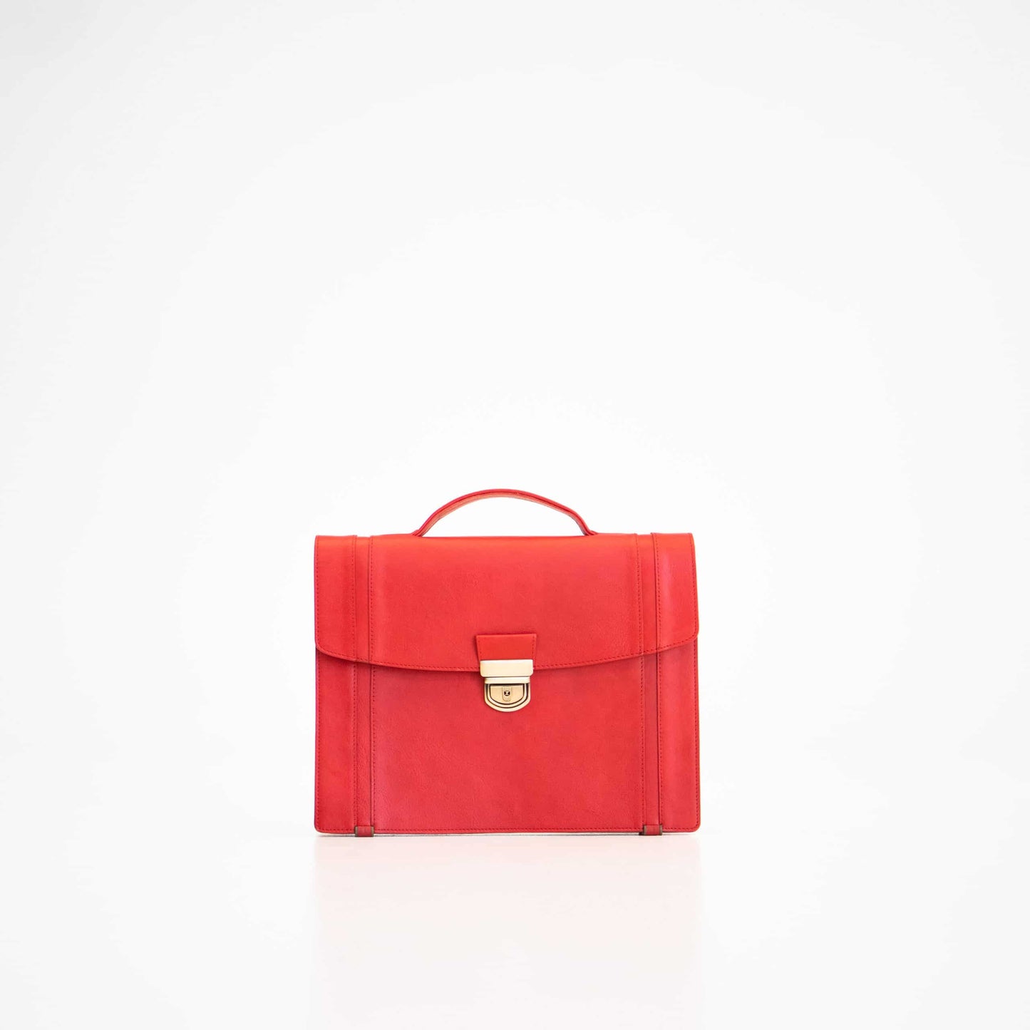 Modern red office bag by Papillon with top handle and secure clasp closure