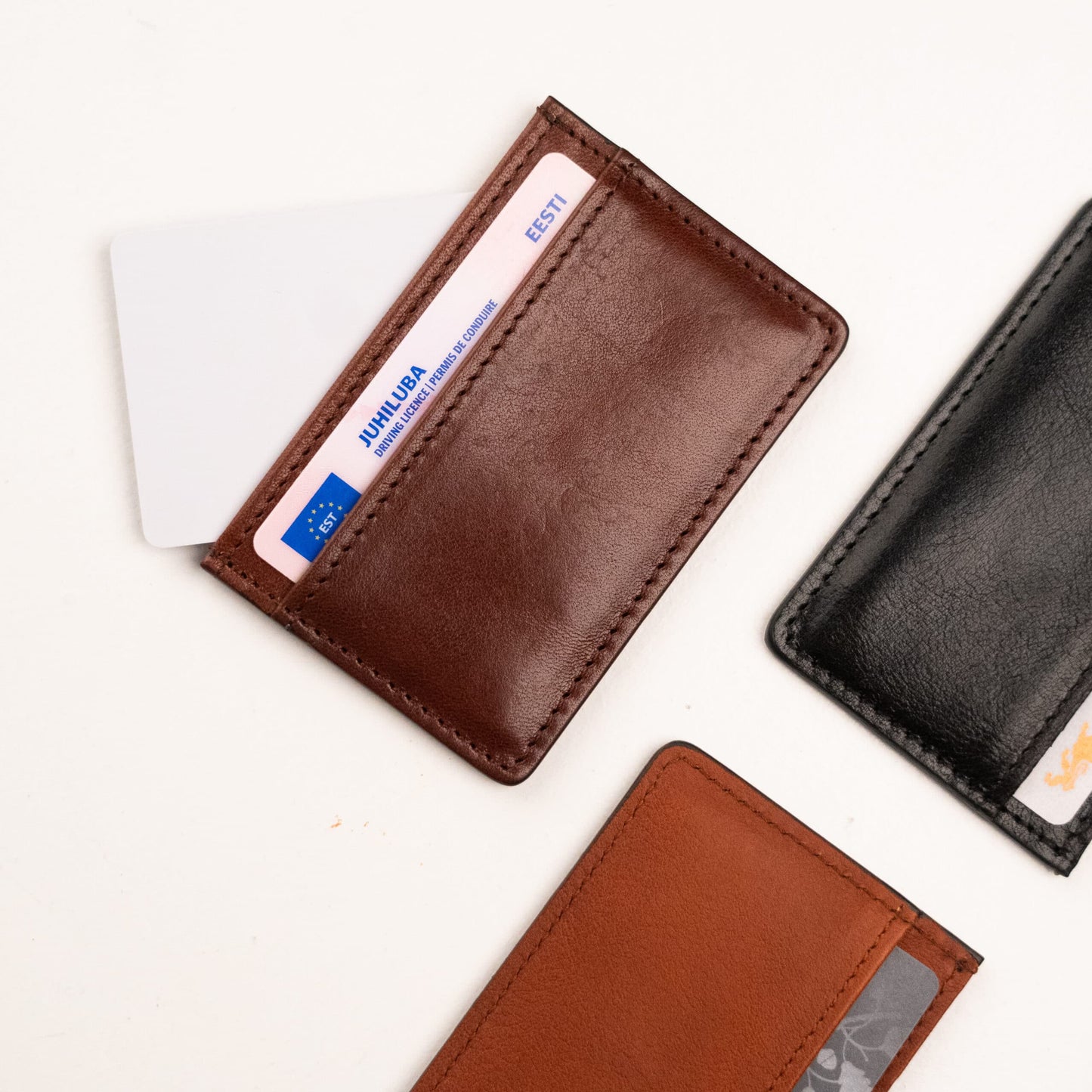 Papillon brown leather card holder with multiple card slots and sleek stitched design