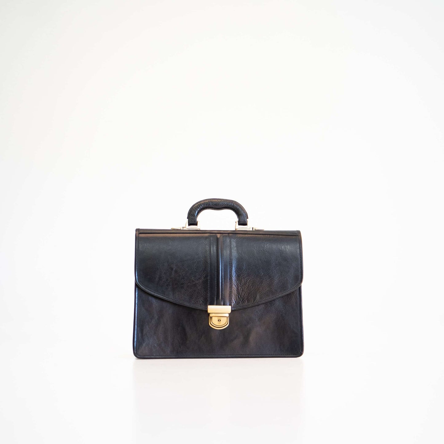 Papillon black leather stylish office briefcase bag with top handle and gold clasp closure