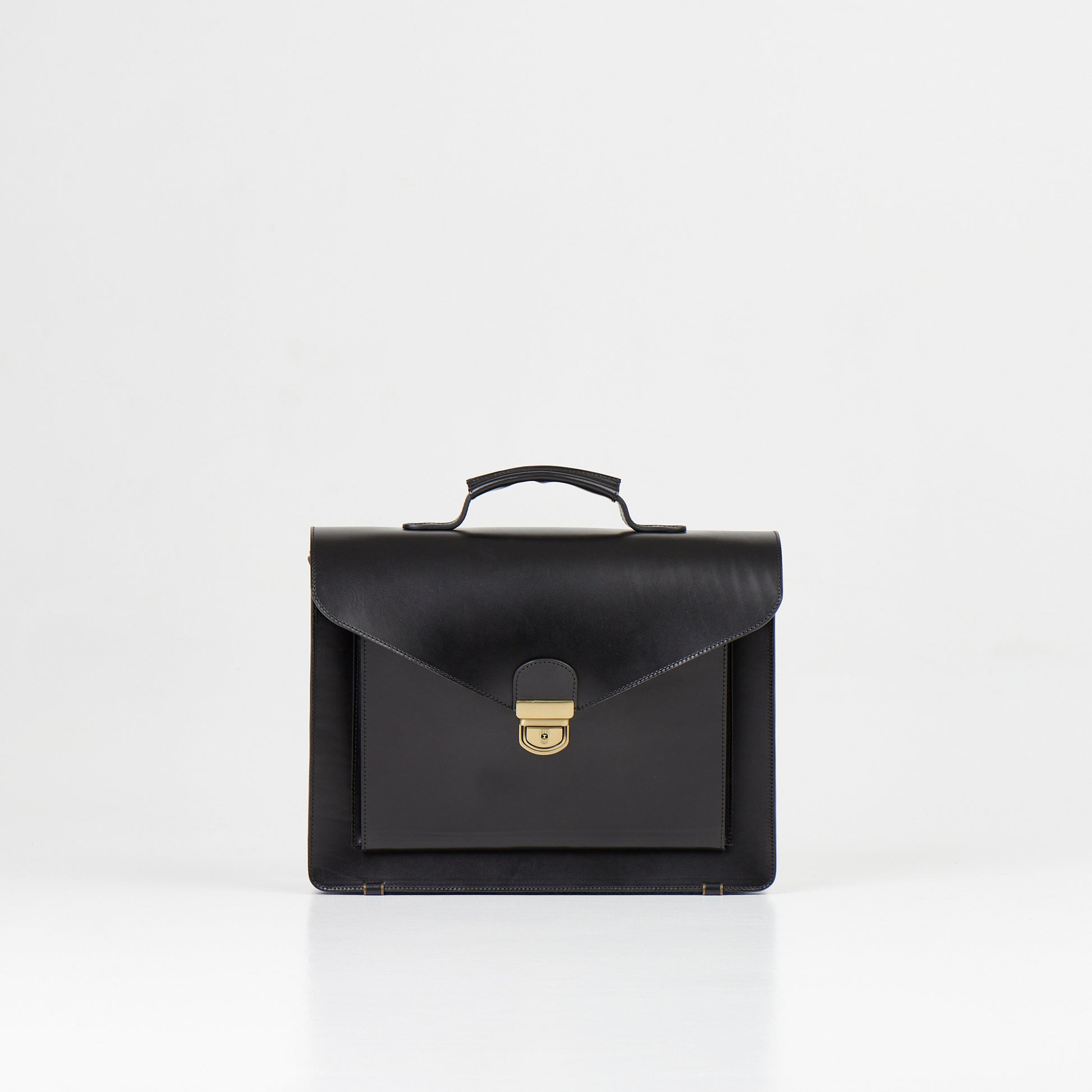 Papillon black artisan leather business bag with top handle and metal clasp closure