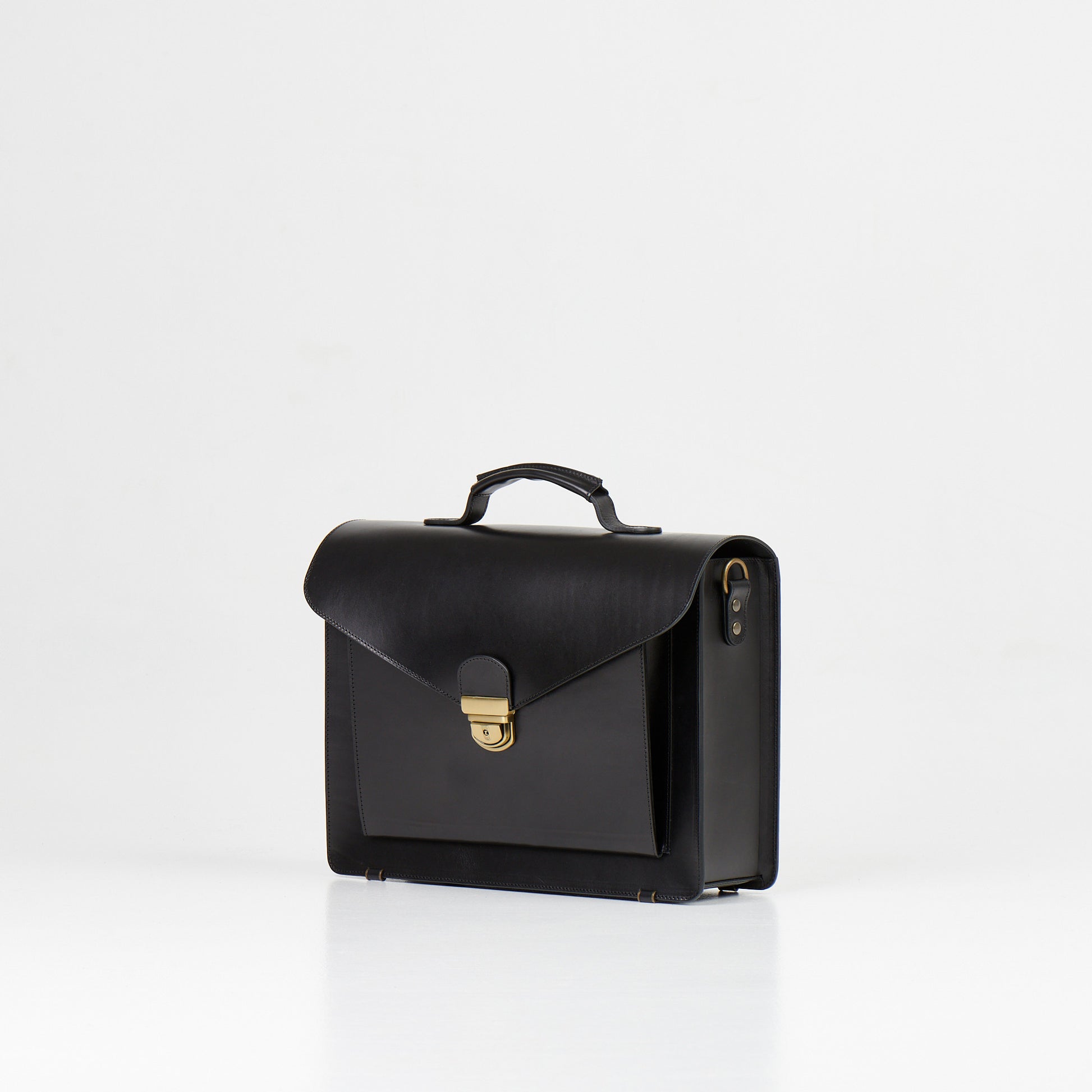 Papillon black artisan leather business bag with top handle and front clasp closure for professionals