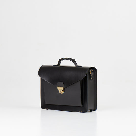Papillon black artisan leather business bag with top handle and front clasp closure for professionals
