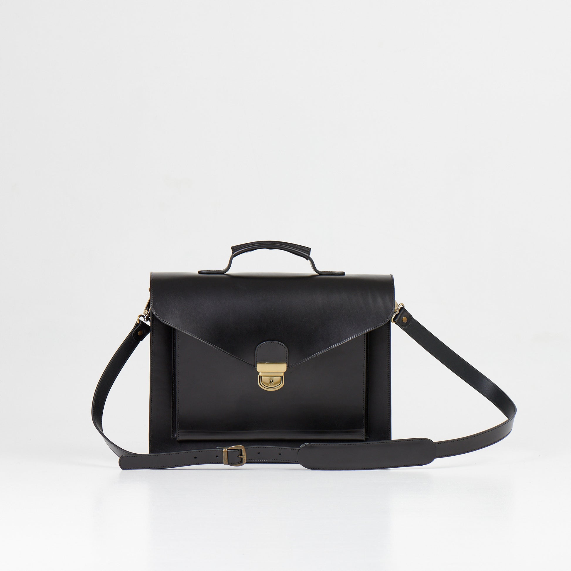 Papillon black artisan leather business bag with top handle and adjustable shoulder strap