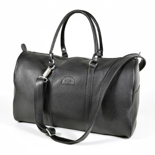 Papillon black leather travel bag with top handles and adjustable shoulder strap