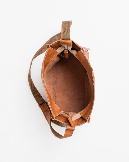 Open view of soft leather sling bag for women in tan brown with adjustable strap by Trendbag