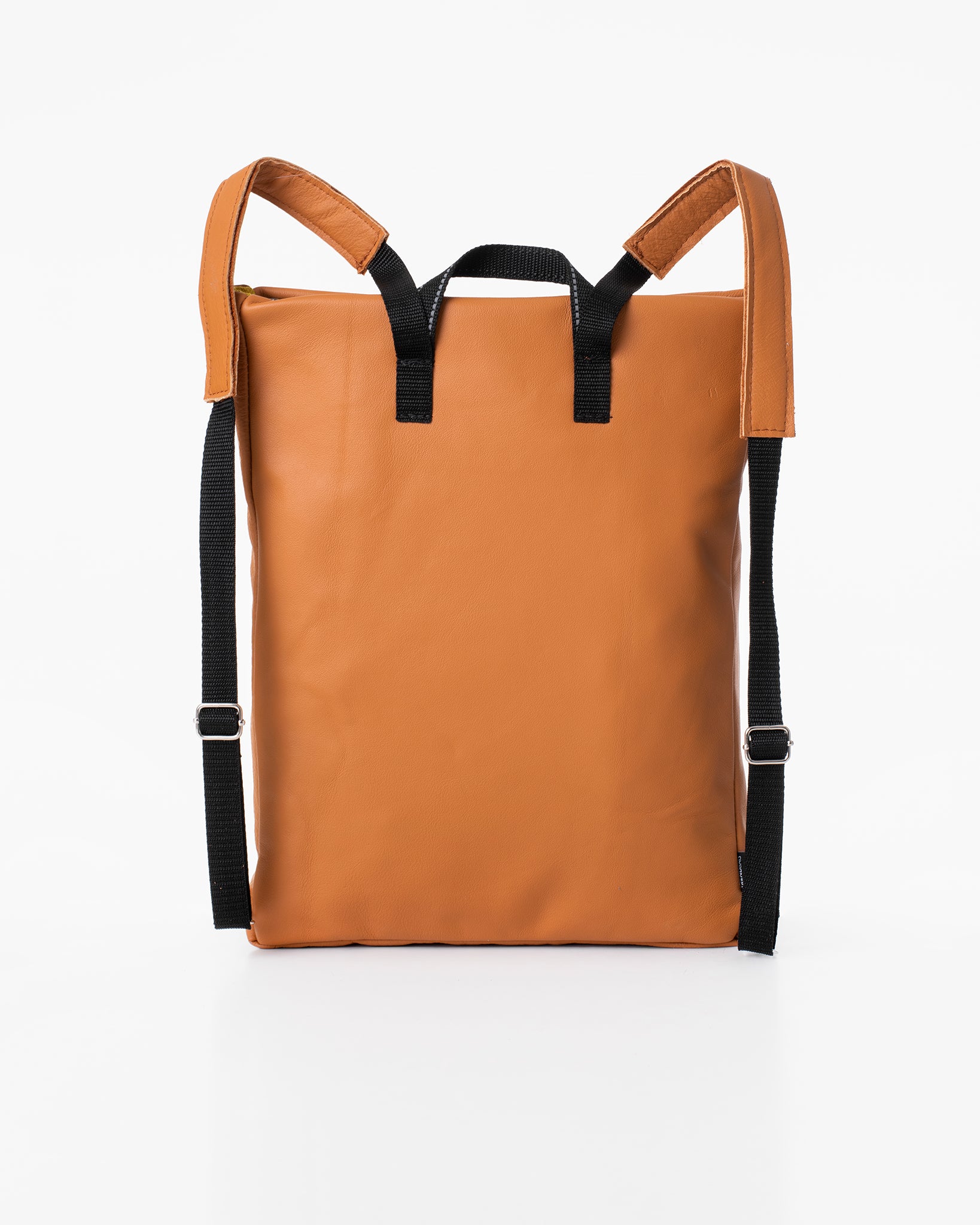 Calvados brown leather backpack by Trendbag with black adjustable straps and minimalist design