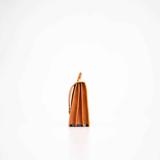 Side view of Papillon classic cognac office bag showing its structured compartments and leather finish