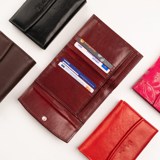 Papillon genuine leather ladies wallet in red open to show multiple card slots and compartments