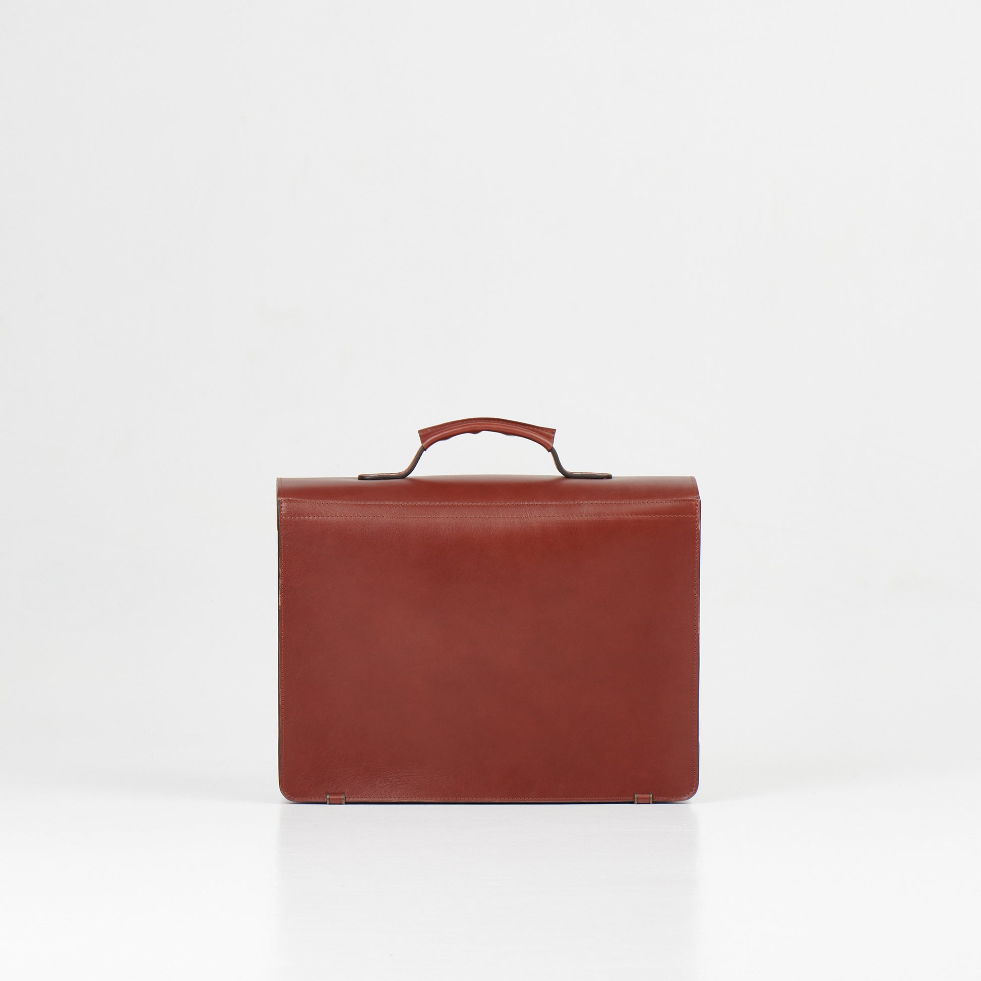 Papillon luxury leather work bag in brown with top handle and sleek minimalist design