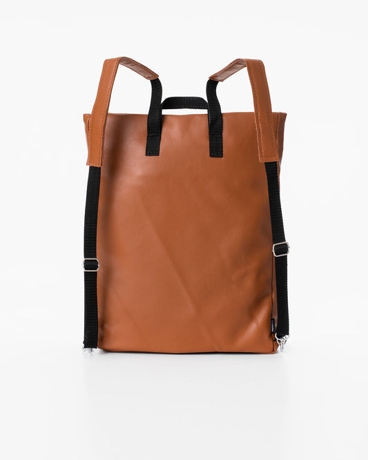 Trendbag peanut leather backpack in brown with black adjustable straps and minimalist design