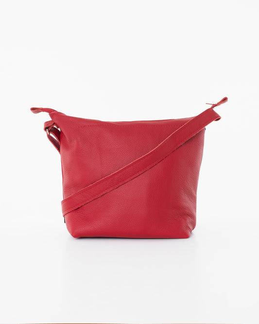 Red small crossbody bag for women by Trendbag with adjustable strap and sleek leather design
